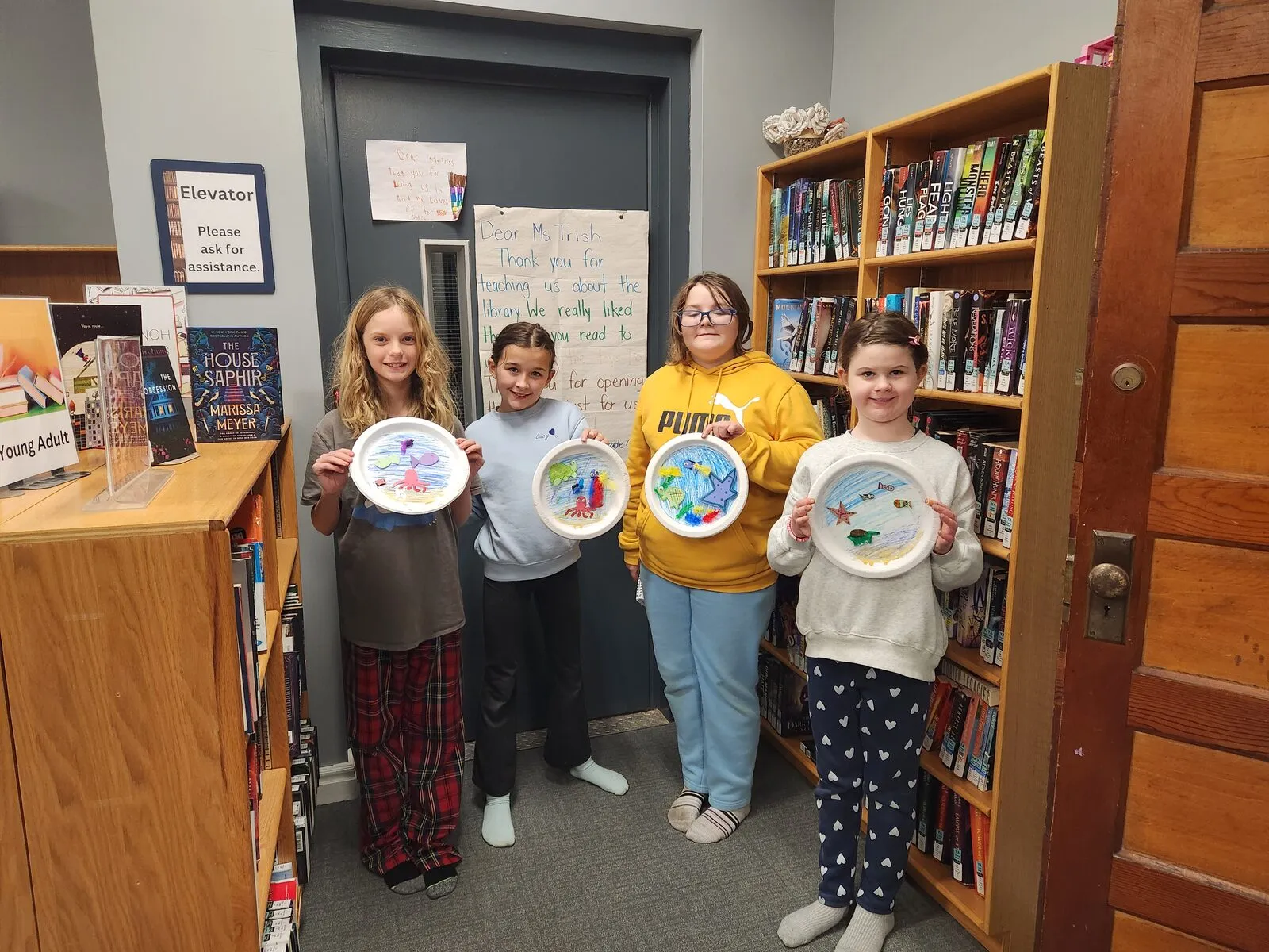 Children learning at the library